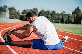 Person Stretching on track