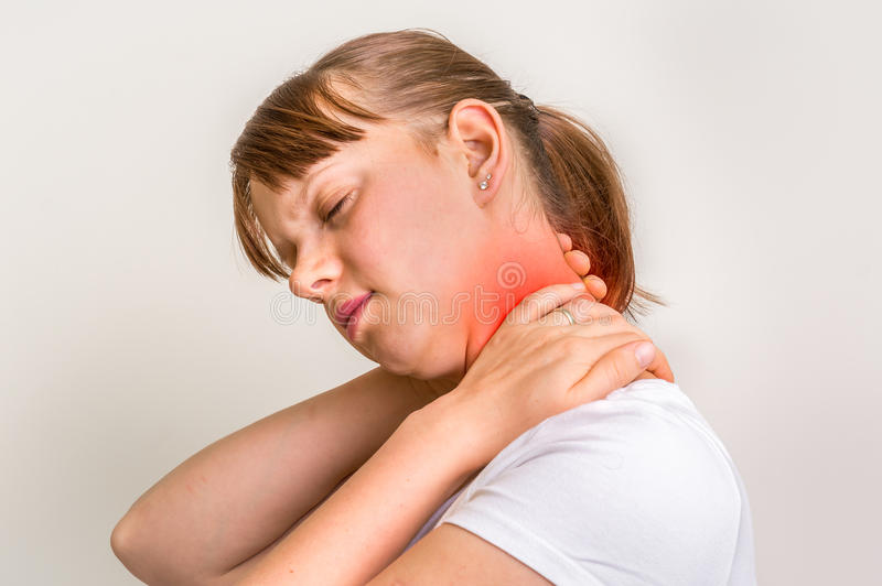 Woman holding her neck from injury