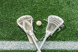 two lacrosse sticks